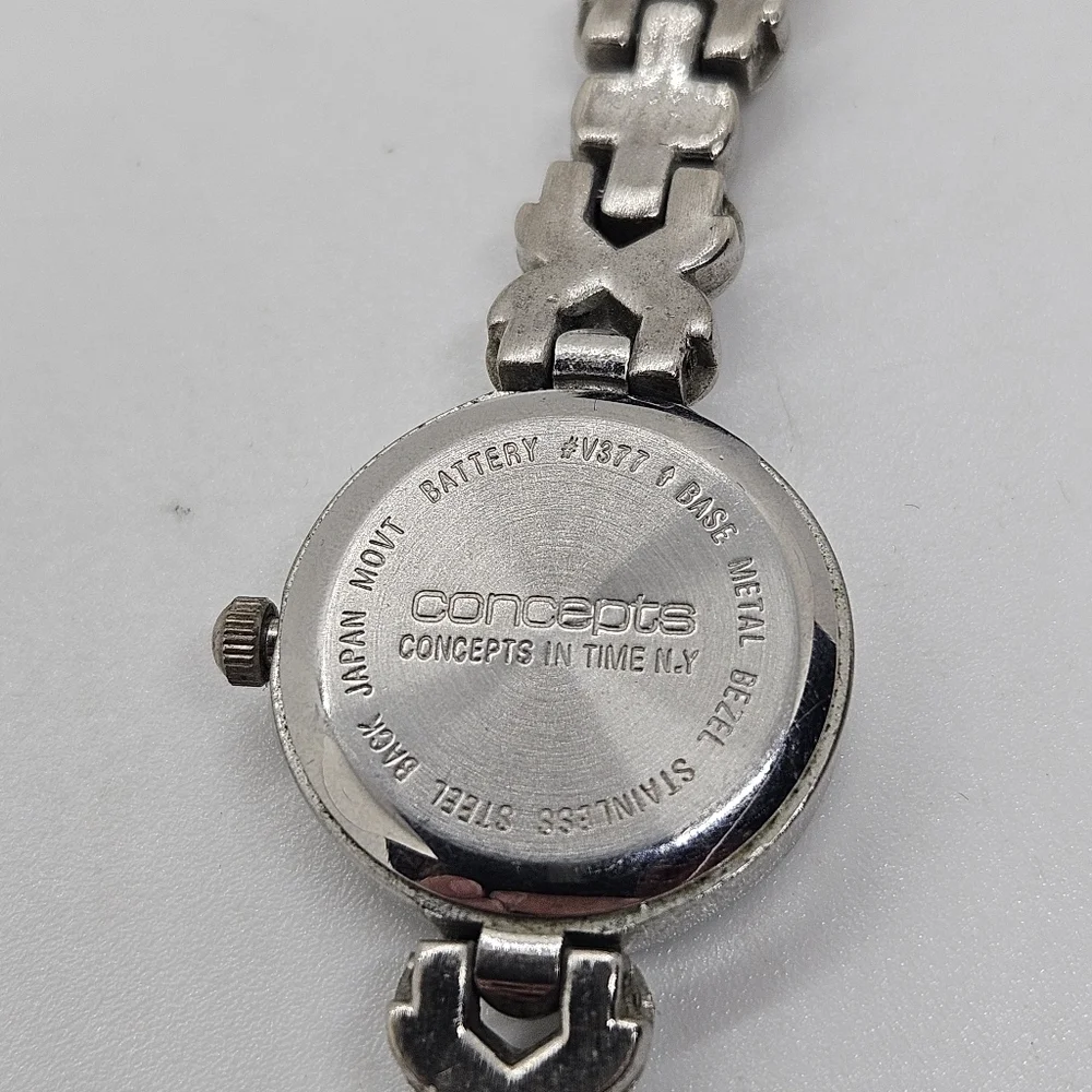 Concepts in Time silver tone watch skinny band with faux abalone and rhinestones